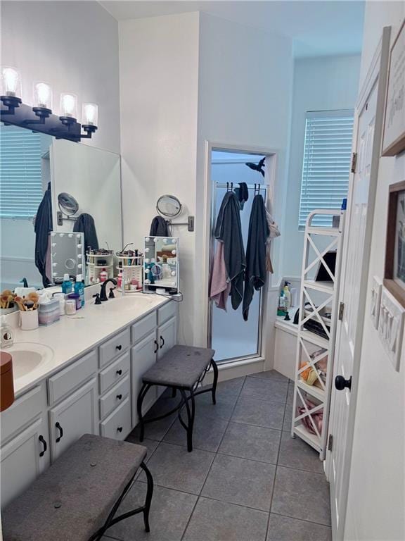 246 Betty Dr, Montz, LA 70068 - bathroom with tile patterned floors and double vanity