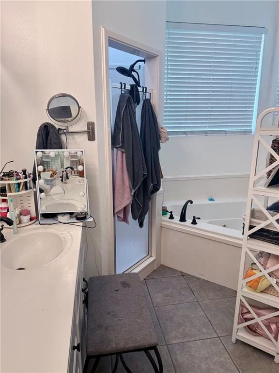 246 Betty Dr, Montz, LA 70068 - bathroom with tile patterned flooring, vanity, and a whirlpool tub