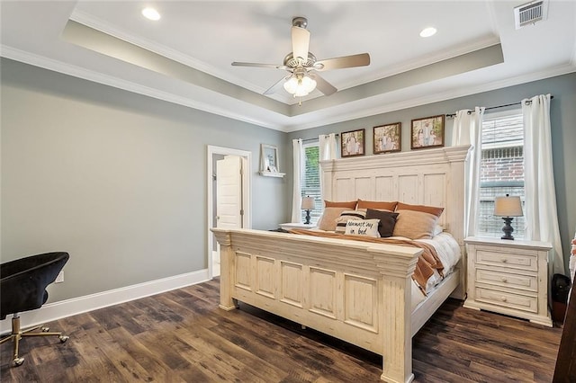 668 Highlands Dr, Slidell, LA 70458 - bedroom featuring a tray ceiling, multiple windows, crown molding, dark wood-style floors, and recessed lighting