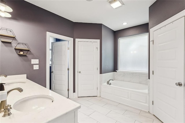 668 Highlands Dr, Slidell, LA 70458 - full bath with a bath, double vanity, tile patterned flooring, a closet, and recessed lighting