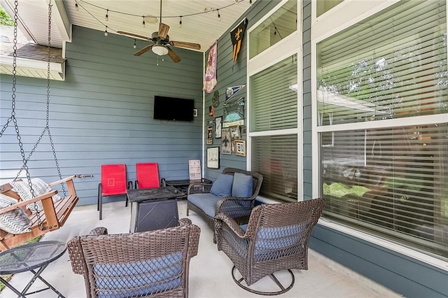 668 Highlands Dr, Slidell, LA 70458 - covered porch with ceiling fan and outdoor lounge area