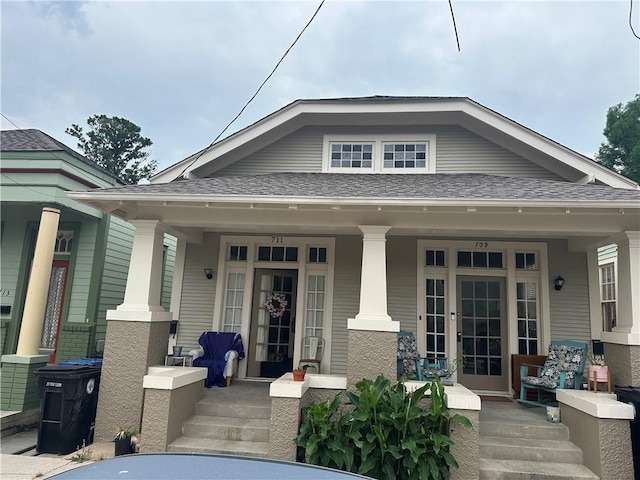 70911 Evelina St, New Orleans, LA 70114 - view of front of home featuring covered porch and roof with shingles