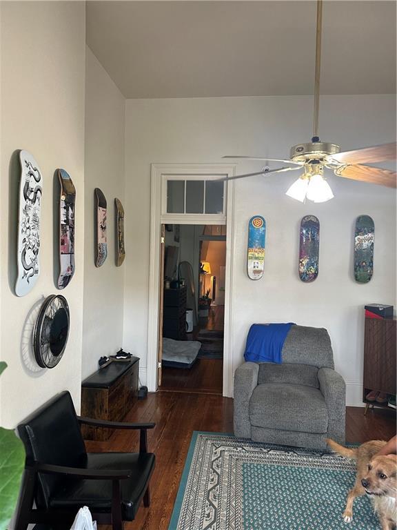 70911 Evelina St, New Orleans, LA 70114 - living area featuring ceiling fan and wood finished floors