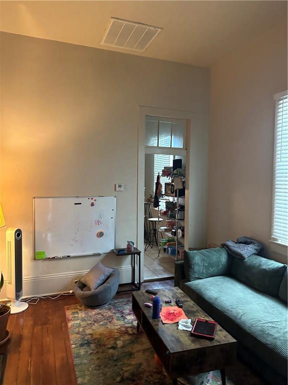 70911 Evelina St, New Orleans, LA 70114 - living room with hardwood / wood-style flooring