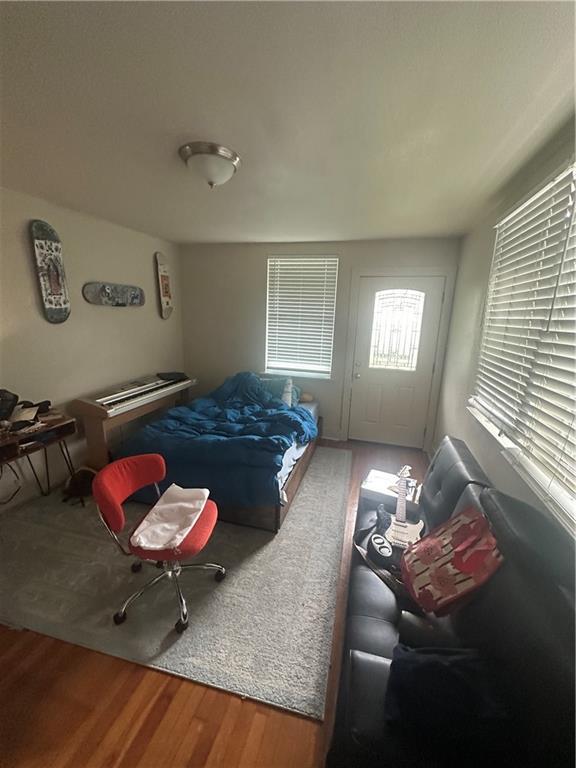 70911 Evelina St, New Orleans, LA 70114 - bedroom featuring wood finished floors