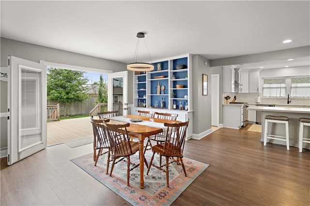 1924 Cammie Ave, Metairie, LA 70003 - dining area with plenty of natural light, wood finished floors, and recessed lighting