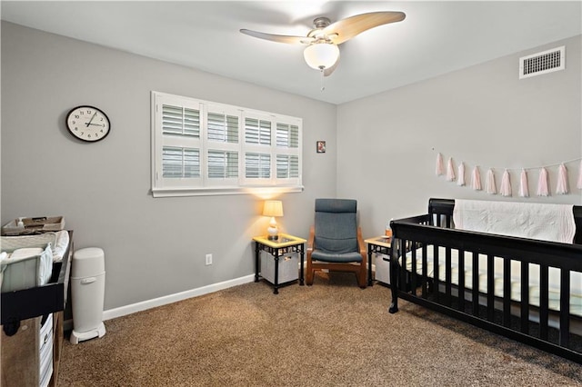 1924 Cammie Ave, Metairie, LA 70003 - bedroom with carpet, baseboards, and ceiling fan