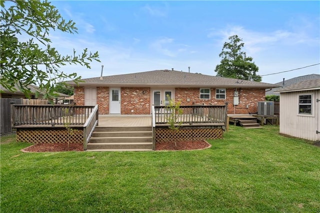 1924 Cammie Ave, Metairie, LA 70003 - rear view of house with central AC unit, brick siding, a wooden deck, and a shingled roof