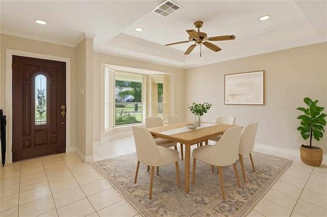 118 Weatherly Cv, Slidell, LA 70458 - dining space with light tile patterned floors, a tray ceiling, a ceiling fan, recessed lighting, and ornamental molding