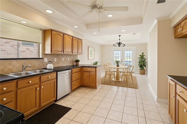 118 Weatherly Cv, Slidell, LA 70458 - kitchen with stainless steel dishwasher, a sink, dark countertops, backsplash, and recessed lighting