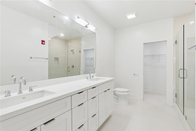 822 N Rampart St Unit 301, New Orleans, LA 70116 - full bathroom with a spacious closet, a shower stall, double vanity, and toilet
