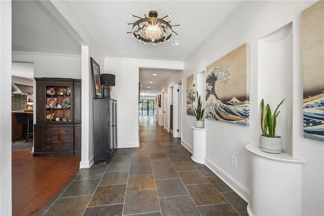 788 Amethyst St, New Orleans, LA 70124 - hallway with baseboards, stone tile flooring, ornamental molding, and recessed lighting