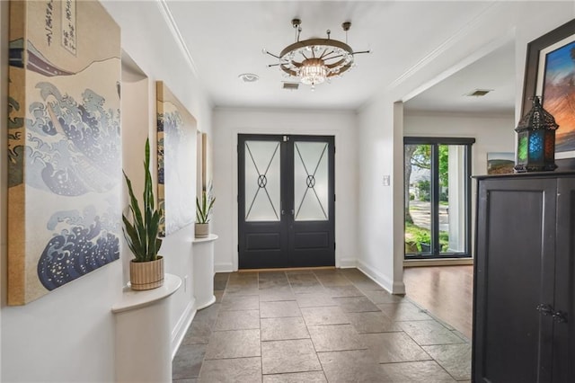 788 Amethyst St, New Orleans, LA 70124 - entryway with baseboards, stone tile floors, and crown molding