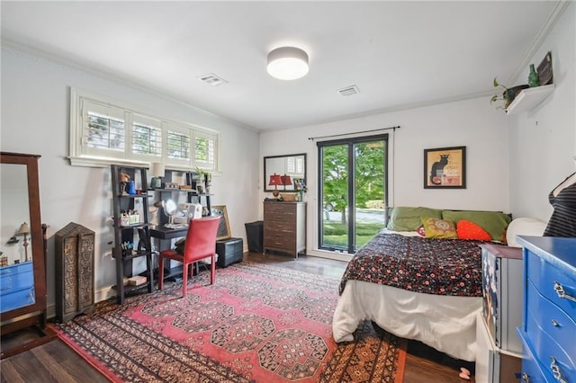 788 Amethyst St, New Orleans, LA 70124 - bedroom with wood finished floors, multiple windows, access to outside, and ornamental molding