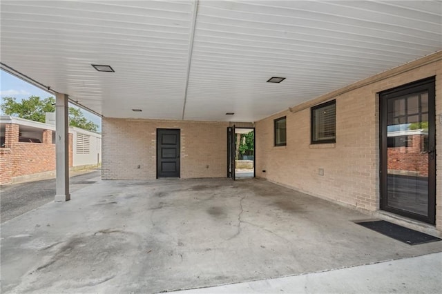 788 Amethyst St, New Orleans, LA 70124 - view of patio / terrace featuring an attached carport