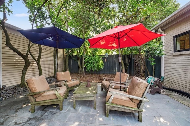 788 Amethyst St, New Orleans, LA 70124 - fenced backyard featuring a patio and an outdoor hangout area