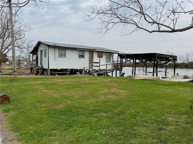 2861 Ridgeway Blvd, New Orleans, LA 70129 - dock area with a yard and a water view