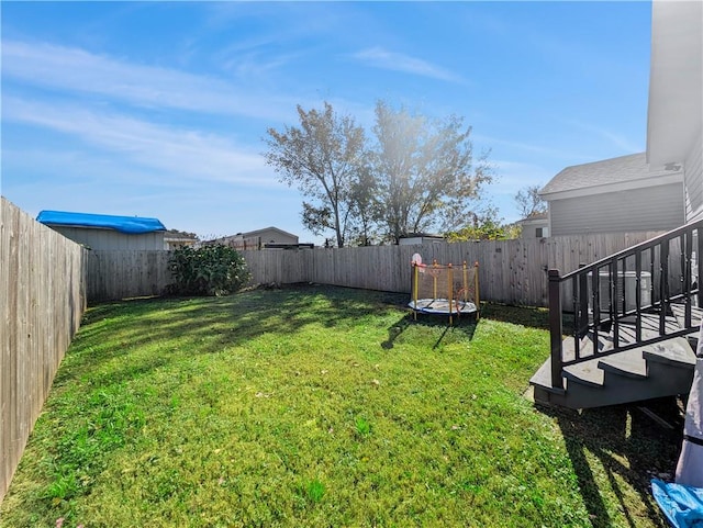 1013 S Starrett Rd, Metairie, LA 70003 - view of yard featuring a trampoline, cooling unit, and stairs