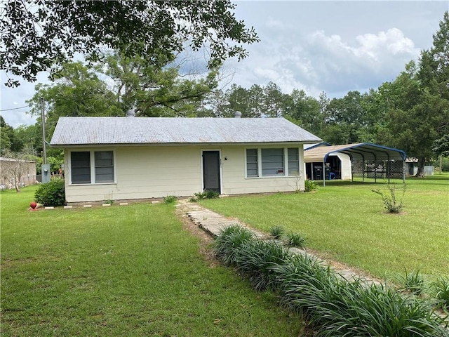 63070 Oak St, Roseland, LA 70456 - single story home with a front yard and a carport