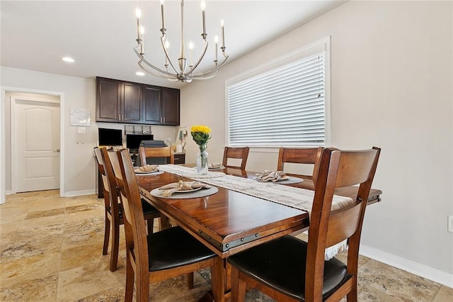 613 Andrews Ave, Metairie, LA 70005 - dining space with a chandelier, recessed lighting, baseboards, and light stone finish flooring