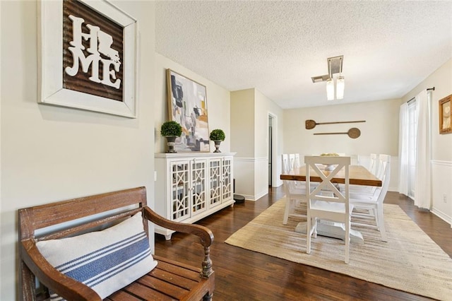 4212 Pommard Dr, Kenner, LA 70065 - dining area with a textured ceiling and wood finished floors