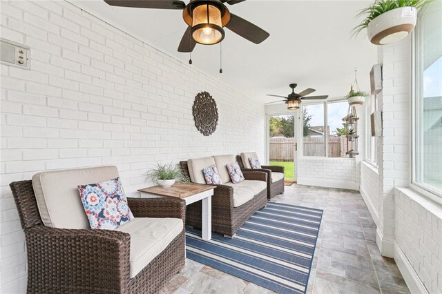 4212 Pommard Dr, Kenner, LA 70065 - sunroom with ceiling fan and outdoor lounge area