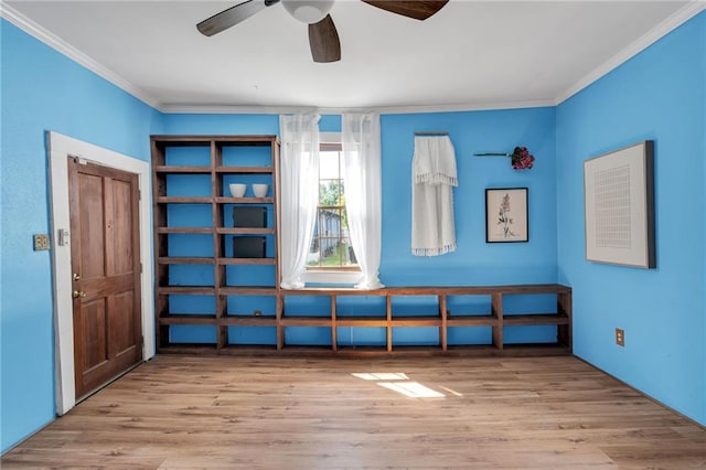 8301 Belfast St Unit 8303, New Orleans, LA 70118 - spare room with ornamental molding, a ceiling fan, and wood finished floors