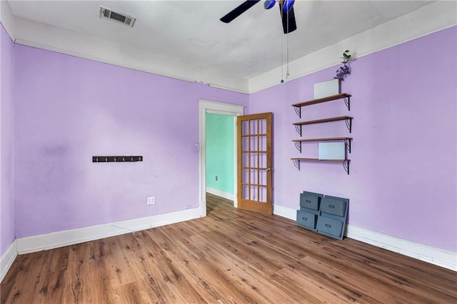 8301 Belfast St Unit 8303, New Orleans, LA 70118 - empty room featuring ceiling fan, baseboards, and wood finished floors