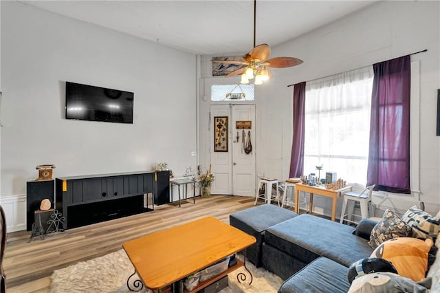 8301 Belfast St Unit 8303, New Orleans, LA 70118 - living area featuring wood finished floors and a ceiling fan
