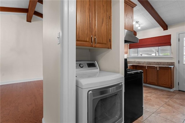6416 Nora St, Metairie, LA 70003 - washroom with washer / dryer and cabinet space