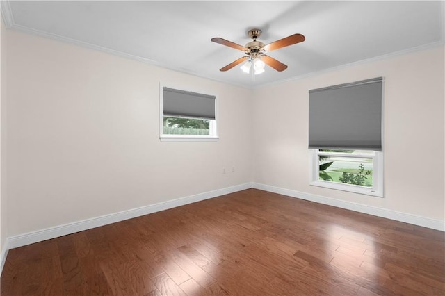 6416 Nora St, Metairie, LA 70003 - unfurnished room with healthy amount of natural light, wood finished floors, crown molding, and a ceiling fan