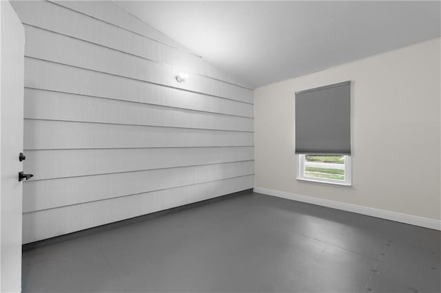 6416 Nora St, Metairie, LA 70003 - unfurnished room featuring vaulted ceiling and concrete floors
