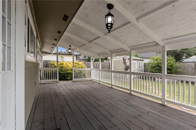 6416 Nora St, Metairie, LA 70003 - wooden deck with a storage shed and a fenced backyard