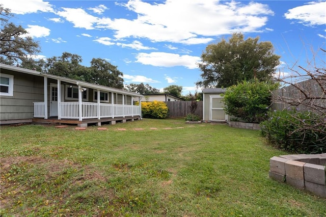 6416 Nora St, Metairie, LA 70003 - view of yard featuring a storage shed and a porch