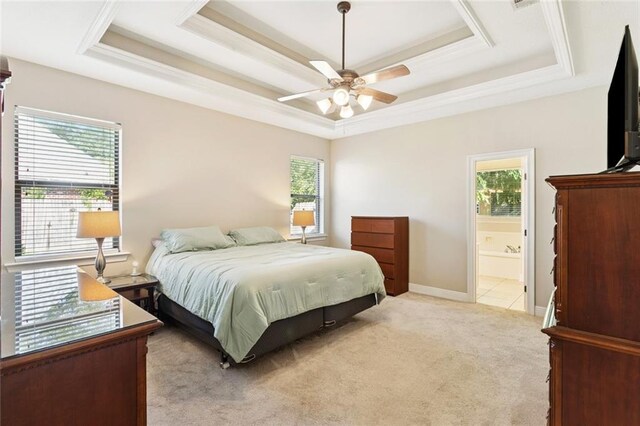 1061 Tallow Tree Dr, Mandeville, LA 70448 - bedroom with a tray ceiling, multiple windows, and light carpet