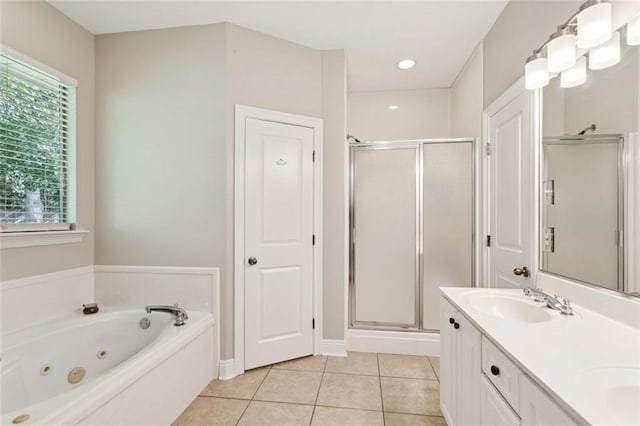 1061 Tallow Tree Dr, Mandeville, LA 70448 - full bathroom with a shower stall, a whirlpool tub, tile patterned flooring, and double vanity