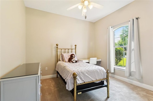 1061 Tallow Tree Dr, Mandeville, LA 70448 - bedroom featuring baseboards, light colored carpet, and multiple windows