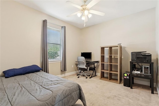 1061 Tallow Tree Dr, Mandeville, LA 70448 - bedroom with carpet flooring, an office area, baseboards, and ceiling fan