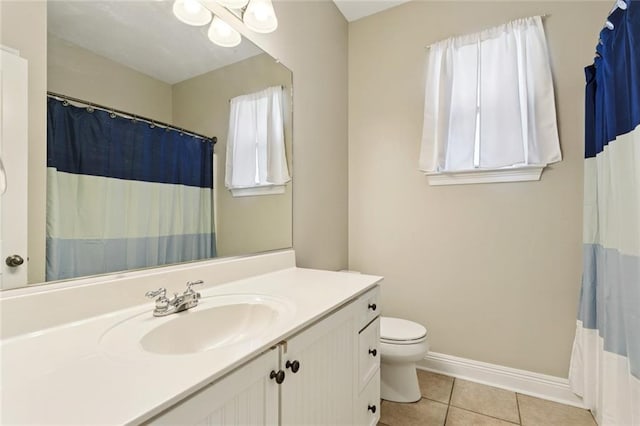 1061 Tallow Tree Dr, Mandeville, LA 70448 - bathroom featuring vanity, toilet, tile patterned floors, and a shower with curtain