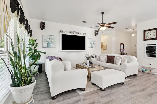 728 Fairfield Loop, Slidell, LA 70458 - living room featuring wood finished floors and ceiling fan