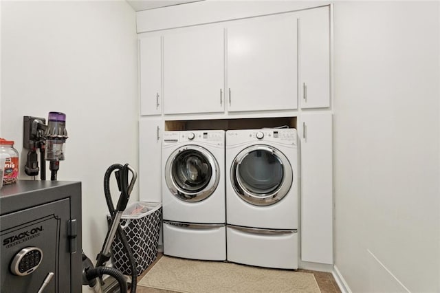 728 Fairfield Loop, Slidell, LA 70458 - laundry room featuring cabinet space and washing machine and dryer