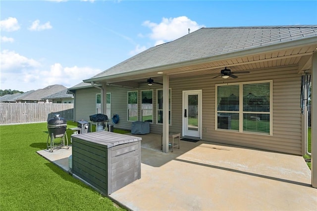 728 Fairfield Loop, Slidell, LA 70458 - view of patio / terrace featuring ceiling fan, area for grilling, and a fire pit
