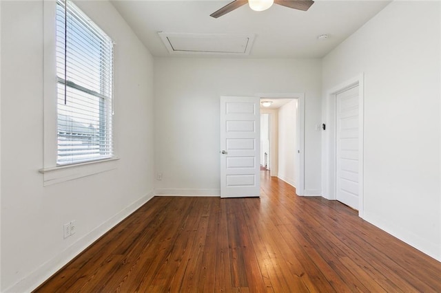 3019 Burdette St, New Orleans, LA 70125 - unfurnished room with ceiling fan, dark wood-type flooring, baseboards, and attic access