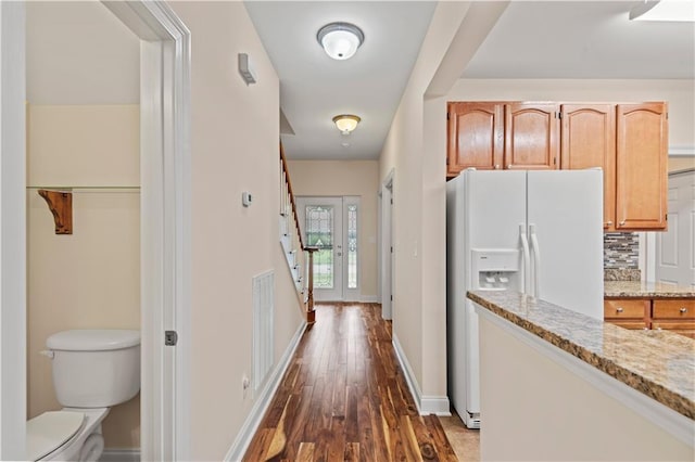 816 Celeste Ave, River Ridge, LA 70123 - corridor with dark wood-type flooring and baseboards