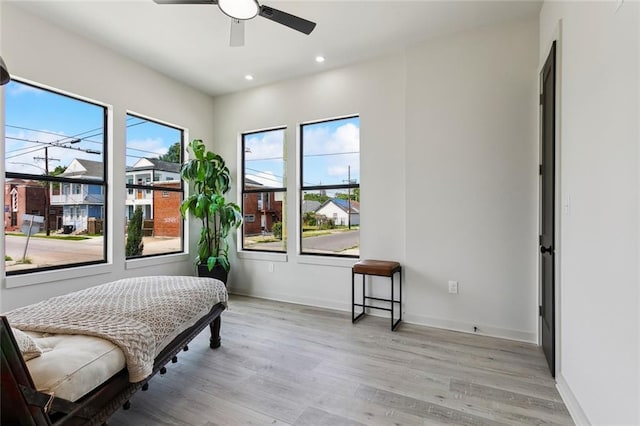 2404 Danneel St, New Orleans, LA 70113 - bedroom with light wood finished floors, recessed lighting, baseboards, and ceiling fan