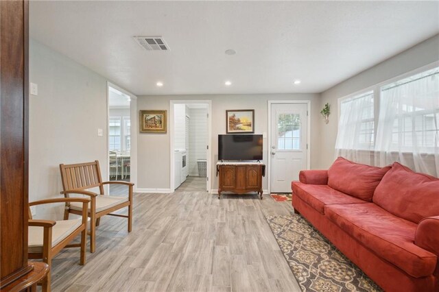 133 Creagan Ave, Gretna, LA 70053 - living room with light wood-type flooring, baseboards, and recessed lighting