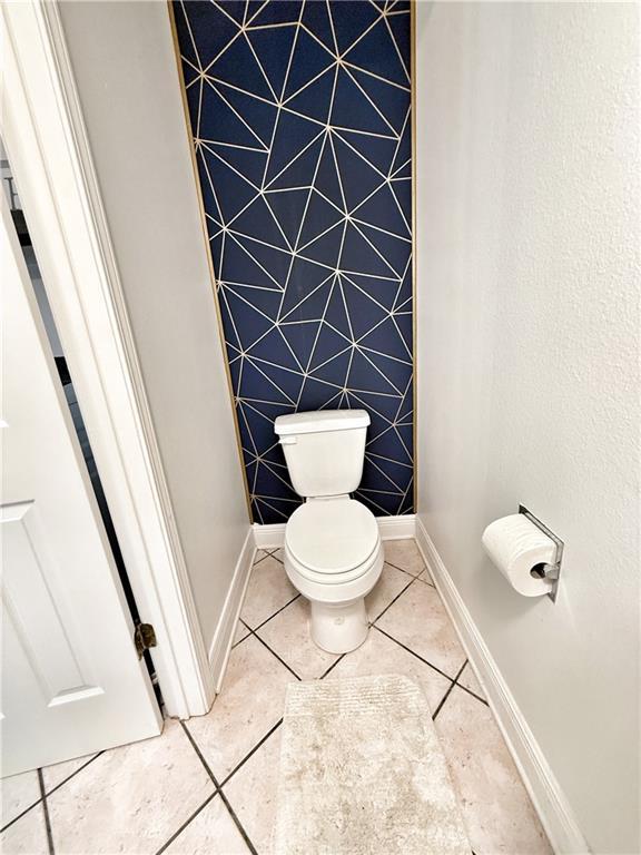 44 Stonebridge Ct, Mandeville, LA 70448 - bathroom with baseboards and tile patterned flooring