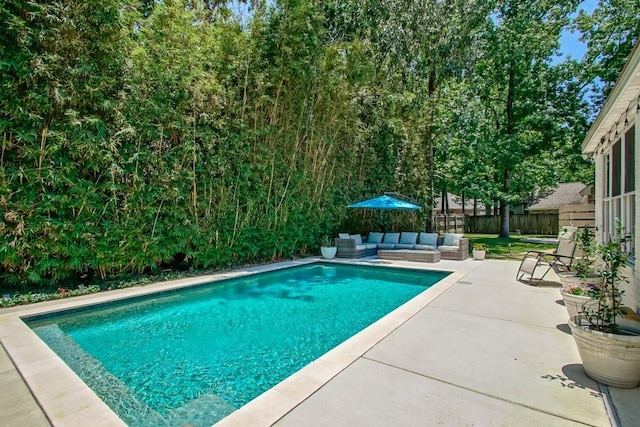 44 Stonebridge Ct, Mandeville, LA 70448 - outdoor pool with an outdoor living space, a patio, and a fenced backyard
