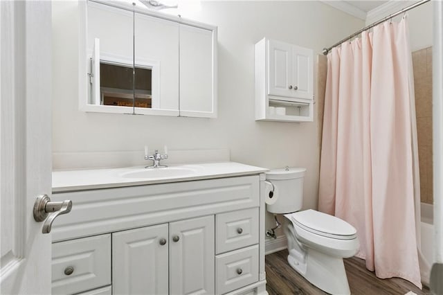 5714 Vicksburg St, New Orleans, LA 70124 - full bathroom featuring vanity, toilet, wood finished floors, shower / tub combo, and crown molding