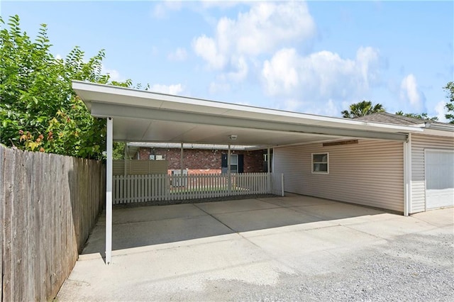 5714 Vicksburg St, New Orleans, LA 70124 - view of front of property with a carport and a garage